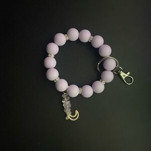 Purple keychain with moon charm